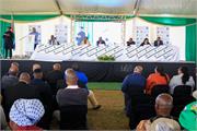 09 - Minister Senzo Mchunu on the podium addressing the community